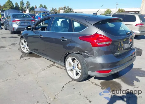 2015 Ford Focus Titanium z USA, uszkodzony, nr VIN 1FADP3N24FL386265